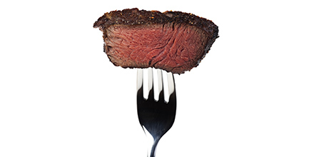 Photo of steak on a fork